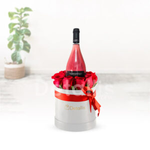 Caja de rosas con vino tabernero